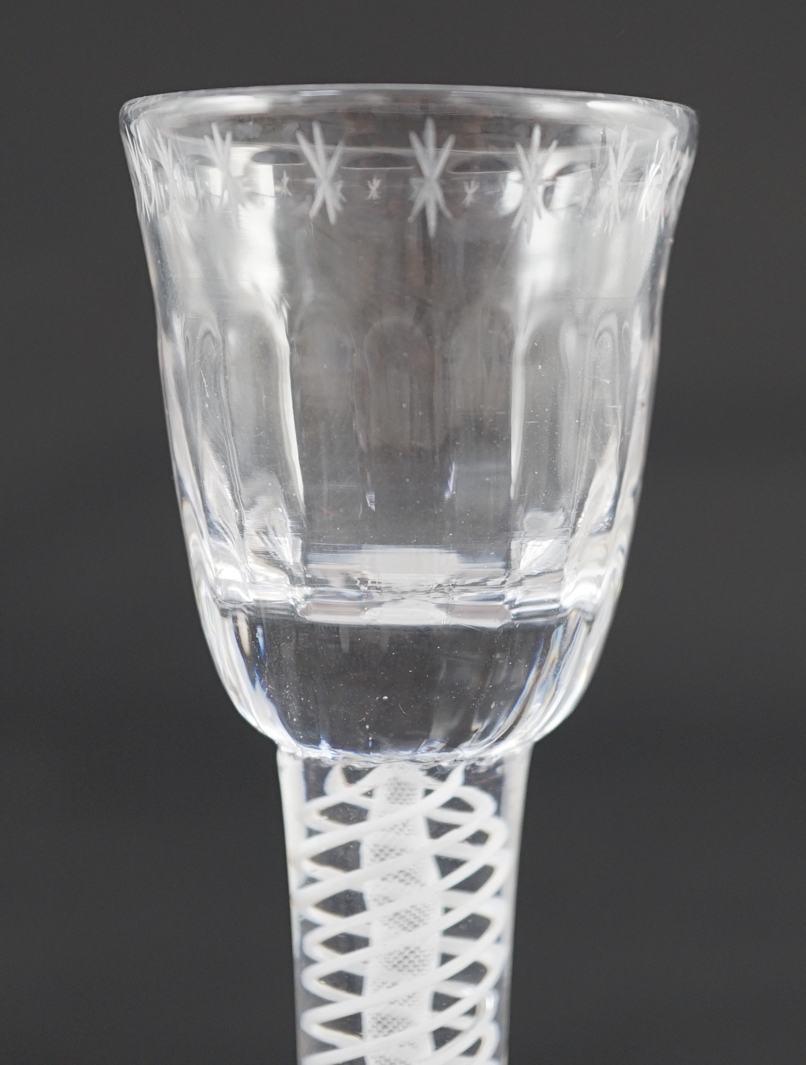 A DSOT stem cordial glass, c. 1760. 17cm tall